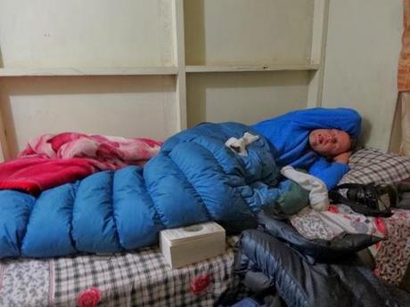 Pure exhaustion in a warm sleeping bag