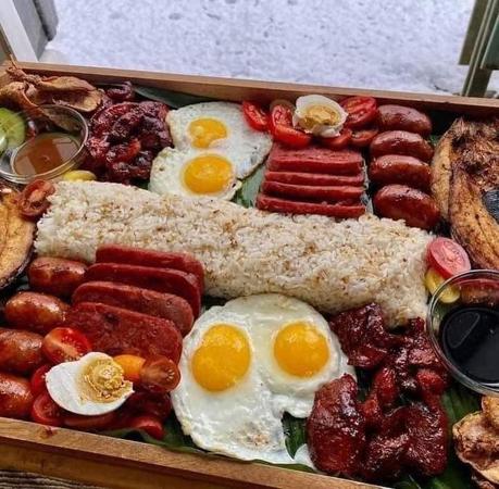 Filipino breakfast, Pinoy morning feast, garlic rice, corned beef, longganisa, SPAM, kamayan-style breakfast, tocino, tapa, grilled fish, Filipino cuisine, breakfast spreads, culinary traditions, hearty meal, family-style meal, food blog, I Love Tansyong.