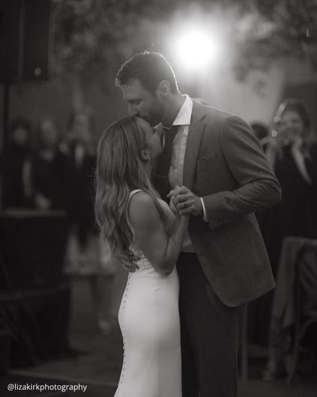 documentary style wedding photography brides and grooms dancing on the dance floor under the soffits