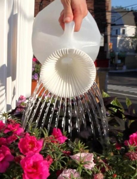 Watering can Made With an Empty Plastic Milk Bottle