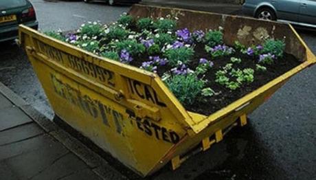 Refuse Skip made into garden