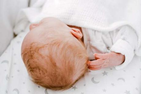 Here's everything you need to know about flat head in babies - what causes it, how to remedy it at home and if any treatment is necessary.