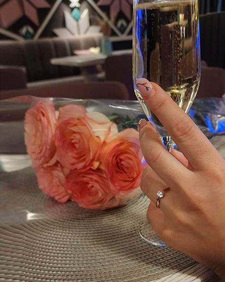 wedding forward chiefs editor real wedding engagement ring on a hand bouquet champagne glass