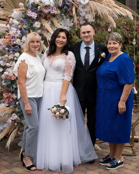 wedding forward chiefs editor real wedding bride and groom posing with wedding guests