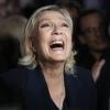 Projections show voters rejecting the far right : NPR French far right leader Marine Le Pen reacts as she meets supporters and journalists after the release of projections based on the actual vote count in select constituencies on Sunday in Henin-Beaumont, northern France.