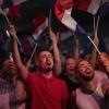 Projections show voters rejecting the far right : NPR Supporters of French far-right leader Marine Le Pen react after vote projections in select constituencies, Sunday, in Henin-Beaumont, northern France. French voters propelled the far-right National Rally to a strong lead in first-round legislative elections Sunday and plunged the country into political uncertainty.