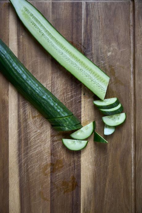 slicing English cucumbers for korean cucumber salad