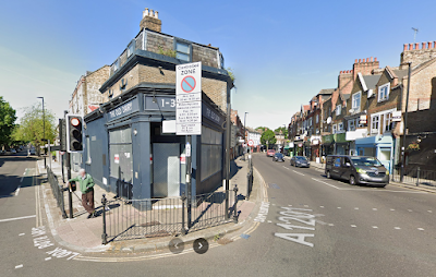 Overpainted Unigate tiles at The Old Dairy, Crouch Hill