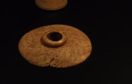 About the origins of the trollen wheel: historical or anachronistic? The decorated disk from Trelleborg on display in the National Museum of Copenhagen. Photo by Jennifer Bray