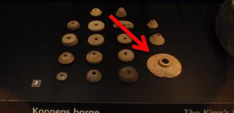 About the origins of the trollen wheel: historical or anachronistic? The decorated disk from Trelleborg on display in the National Museum of Copenhagen. Photo by Jennifer Bray