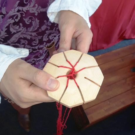 About the origins of the trollen wheel: historical or anachronistic? Locutus trying a reproduction of a trollen wheel in 2015