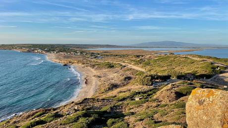 Untouched wild beach on the sinis peninsula with calm sea and blue sky