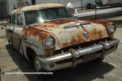 An abandoned 1953 Mercury Monterey woodie wagon, station wagon, in Orlando, Florida.