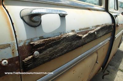 An abandoned 1953 Mercury Monterey woodie wagon, station wagon, in Orlando, Florida.