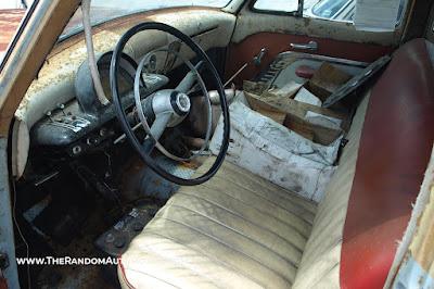 An abandoned 1953 Mercury Monterey woodie wagon, station wagon, in Orlando, Florida.