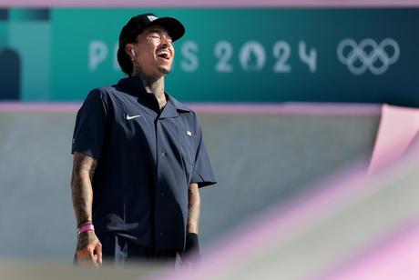 American Nyjah Huston reacts after landing a jump during the finals of the men's street skateboard competition 