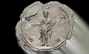 The goddess Vesta standing left, holding patera in right hand, transverse sceptre in left. Face of an Antoninianus coin. Image from Wikimedia Commons