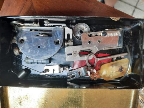 The box of attachments and accessories we found in the drawer of our vintage Vesta Dietrich sewing machine