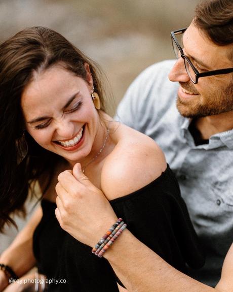 engagement photo captions boy and girl laughing