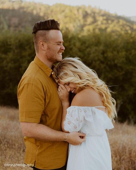 engagement photo captions boy and girl in love laughing