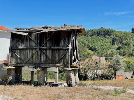 Traditional wooden barn in northern Portugal used for drying corn raised off the ground on stone blocks