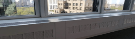 HVAC unit cover with ventilation grilles