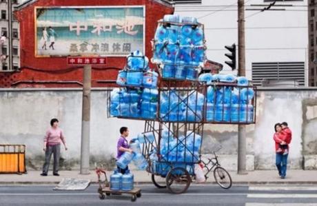 Bicycle Overloaded With Water Bottles