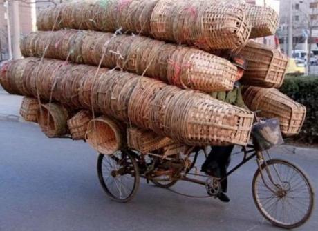 Bicycle Overloaded With Baskets