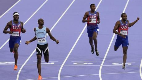 Noah Lyles reveals COVID diagnosis after finishing 200m with bronze : NPR