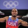 Quincy Hall celebrates winning the gold medal for the U.S. after competing in the Men's 400m final on Wednesday at Stade de France at the Paris Summer Olympics.