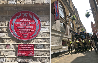 Commemorative plaques and woodblocks in Langley Street, Covent Garden