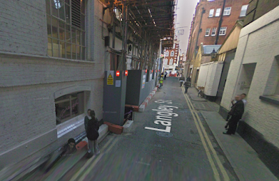 Commemorative plaques and woodblocks in Langley Street, Covent Garden