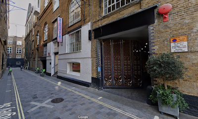 Commemorative plaques and woodblocks in Langley Street, Covent Garden