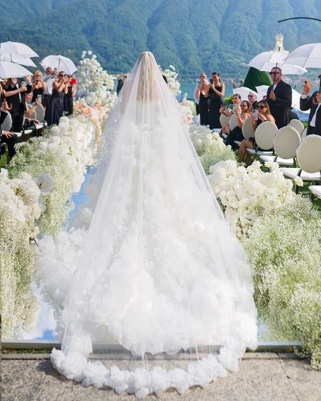 angelina and vladyslavs wedding bride going to aisle veil