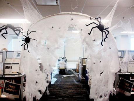 Creepy spider web gate with giant spider in the office