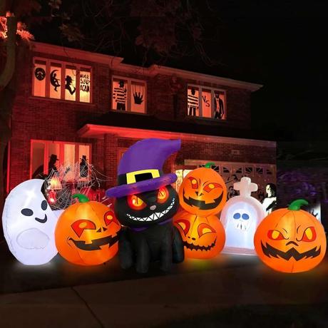 25 Best Halloween Inflatables to Buy in 2024 inflatable pumpkin and evil looking cat