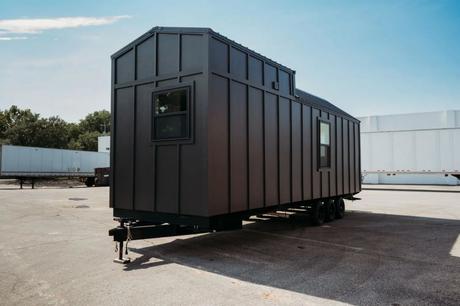 28' Model Tiny is a $70,500 Tiny House with black exterior