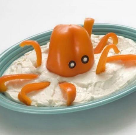 Octopus-shaped pepper in hummus