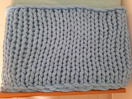 Giant yarn knitted blanket