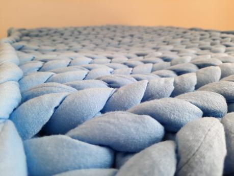 Giant yarn knitted blanket