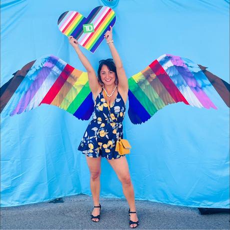 Happy Capital Pride, woman poses at Ottawa Pride Festival