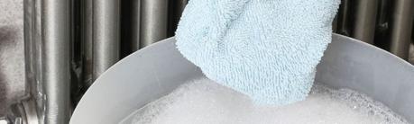 microfibre cloth and a bucket of soapy water for cleaning electric radiators