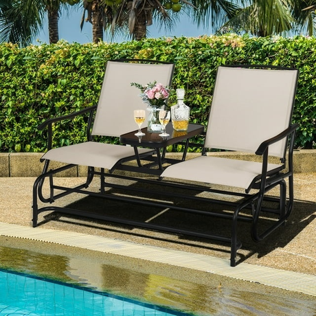 Is a double-glider steel frame loveseat the ultimate backyard luxury, or just a fancy way to ensure you never leave your drink behind while lounging?