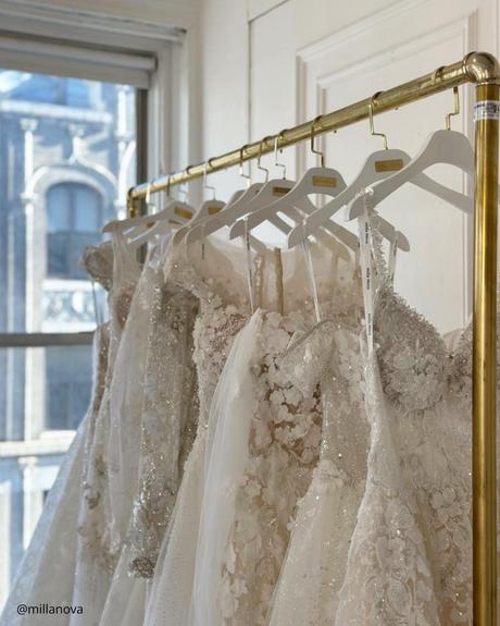 where to buy a wedding dress many shiny wedding dresses on hangers