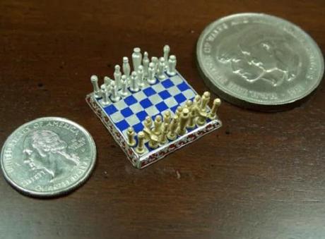 Smallest jewelry chess set in the world 18 karat yellow gold and pure silver