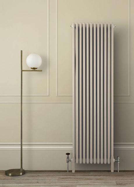 elk brown milano windsor vertical radiator next to a standing lamp