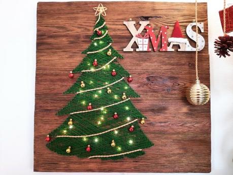 A multimaterial string art Christmas tree with LED lights