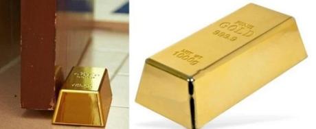 A door stop that looks like a gold bullion bar