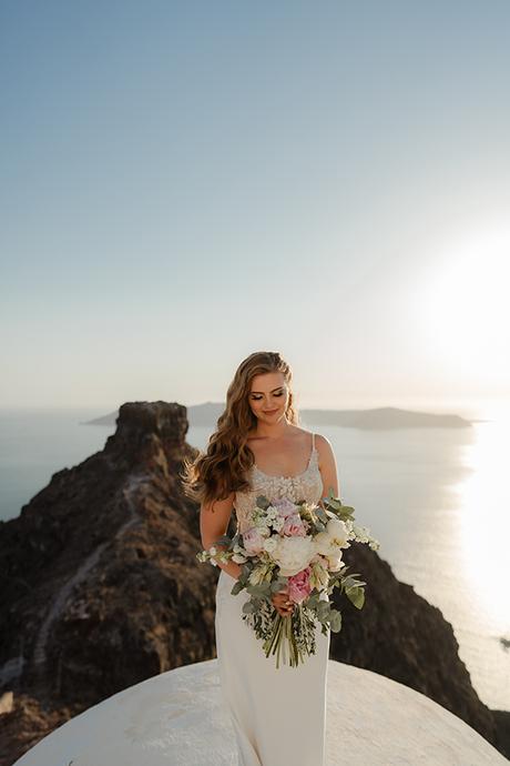 Dreamy elopement in Santorini with roses and peonies  | Angela & Thomas