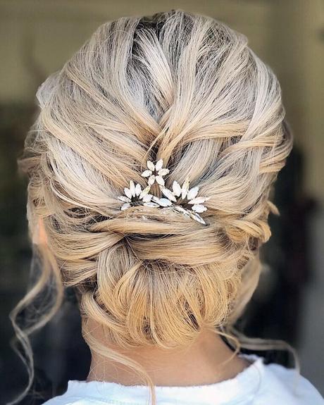 mother of the bride blonde low bun with pin hairandmakeupbysteph